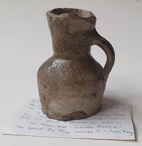 Mediaeval glazed pottery jug believed to have been unearthed during the building of Norwich Town Hall in the early 20th century. 